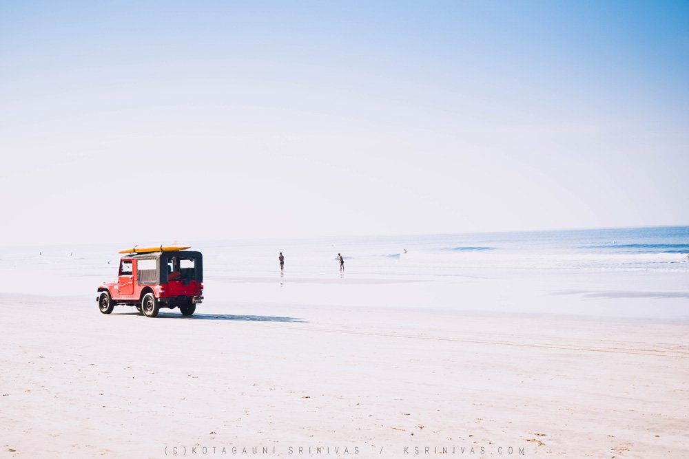 Red Jeep on Beach