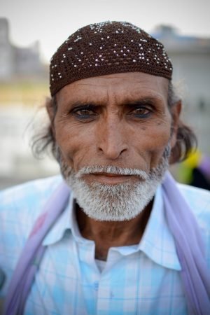 Portrait of a visitor to mecca masjid, hyderabad